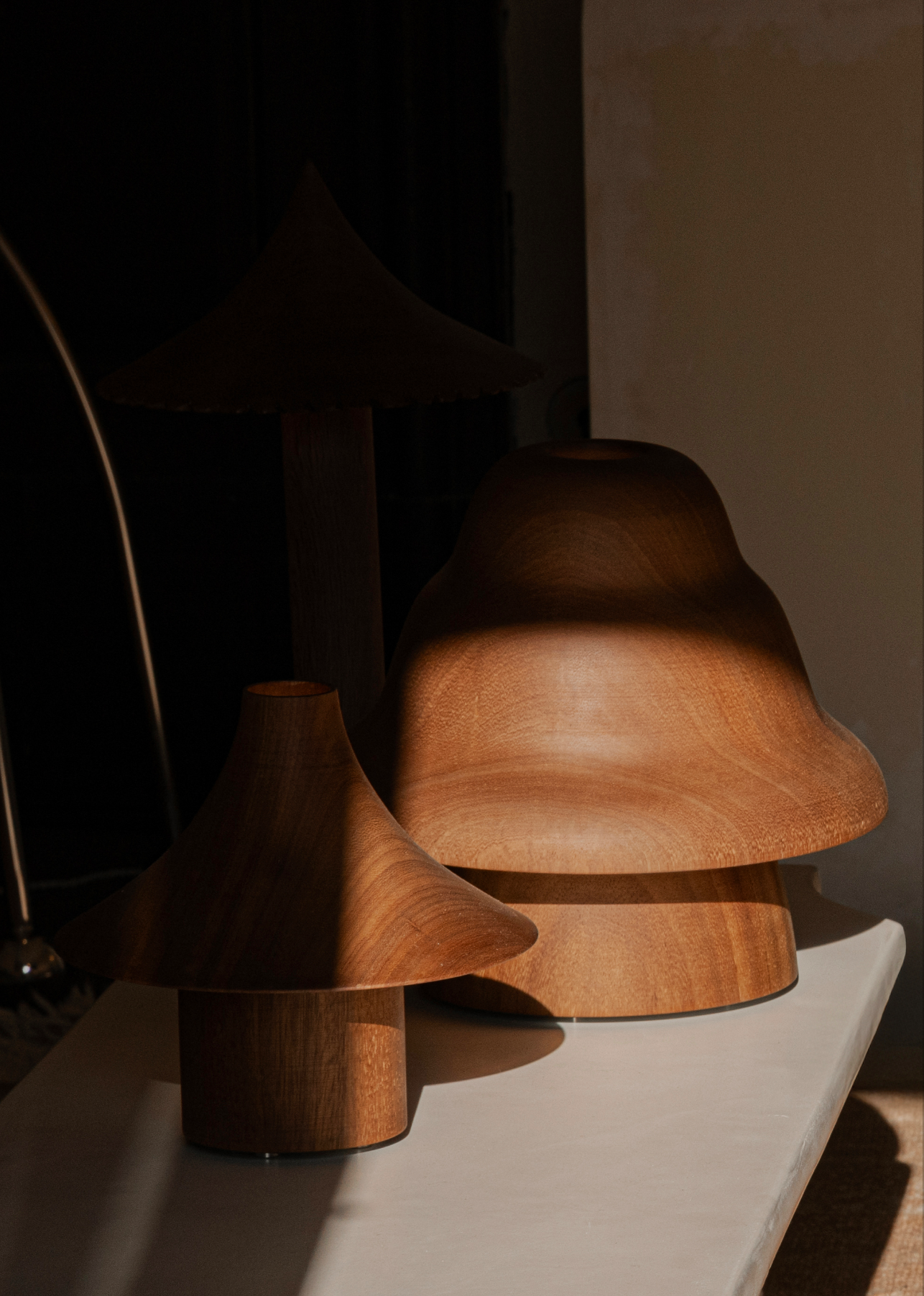 Kilzi lighting | Hat Wobble design table lamp for home decor, a elegant designer lamp of wood soft organic shapes.